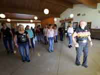 Norm Gifford teaching at the Central Coast Country Dance in Solvang, CA in 2017